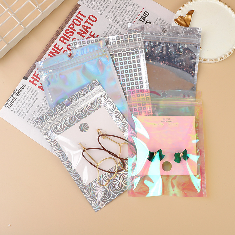 Picture of A variety of laser Yin and Yang bone bag data line hardware products self-sealing bag Electronic Packaging bag jewelry plastic bag