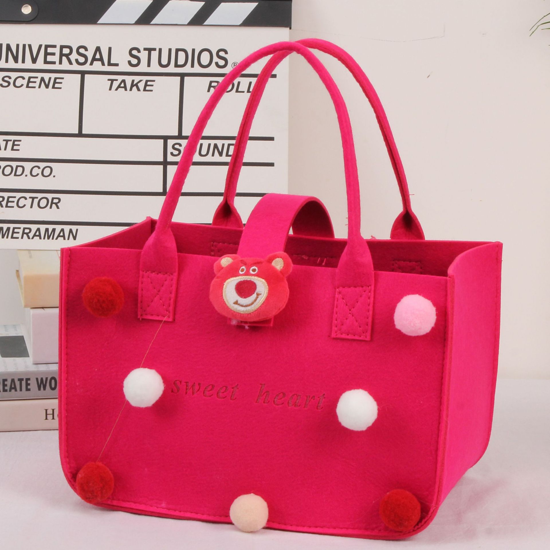 Picture of 2022 felt cartoon handbag hand bag gift bag Net Red full moon wine birthday gift bag wholesale
