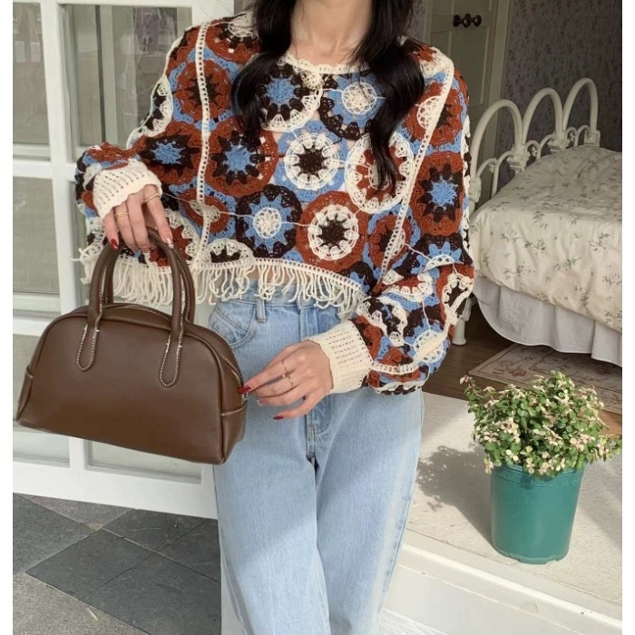 Autumn and Winter lantern long sleeve crocheted hollow sweater design tassel outer blouse round neck loose stacked top