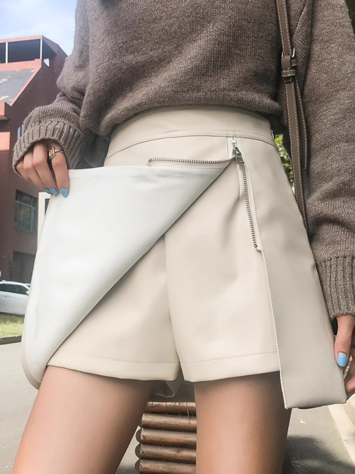 Picture of 2023 Autumn and Winter Elegant PU Leather Skirt Women's High Waist Slimming Irregular Hip Skirt Fashionable Korean A- line Skirt