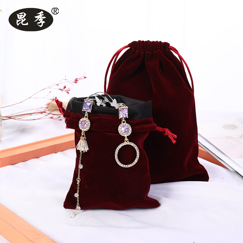 Picture of Boutique bunched flannel bag first jewelry seal text play packaging bag printed electronic products hand string gift storage bag