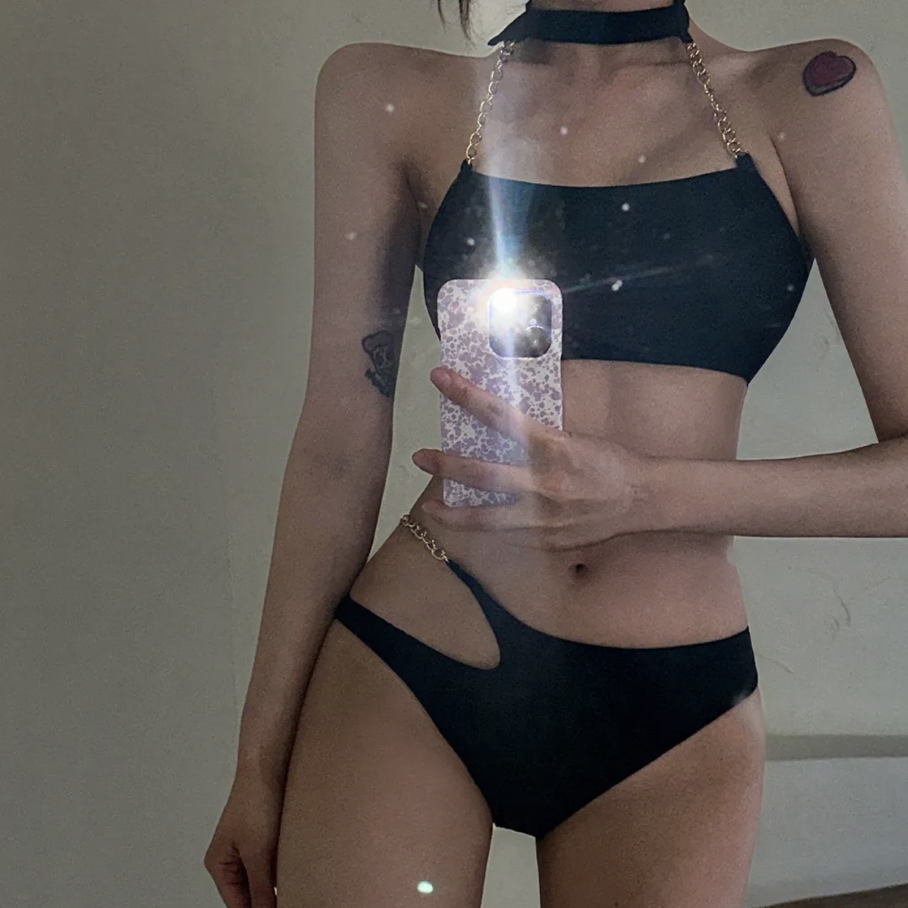 Cross-border supply wholesale sexy hollow bikini swimsuit women's halter iron chain solid color girl tube top beauty back swimsuit