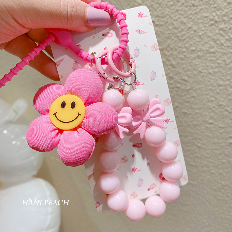 HD4476A05 Korea. Smiley face fabric flower beaded silicone keychain personality sweet Net red wind pendant ornaments