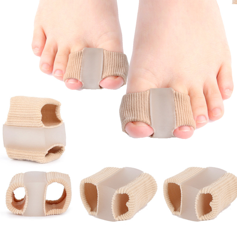 Picture of Toe splitting device thumb valgus big foot bone overlapping toe separator men's and women's fiber double hole toe set orthosis