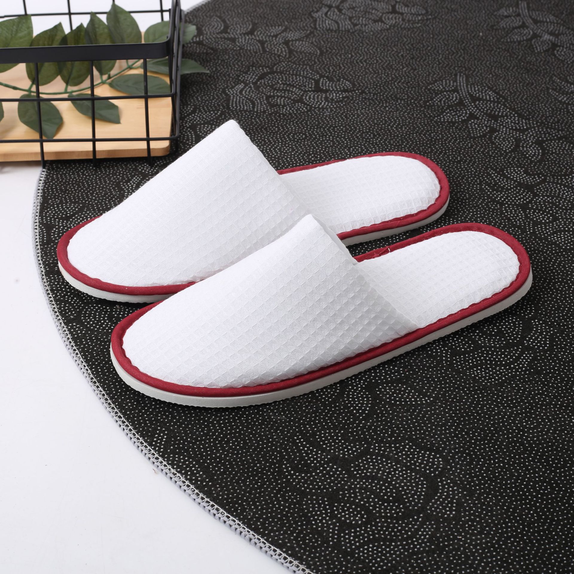 Picture of Hotel and homestay disposable waffle slippers home hospitality travel thickened slippers can be wholesale ordered LOGO