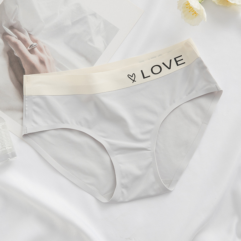 Picture of Naked seamless simple letter sporty women's underwear ice silk breathable mid-waist hip girl's quick-drying briefs
