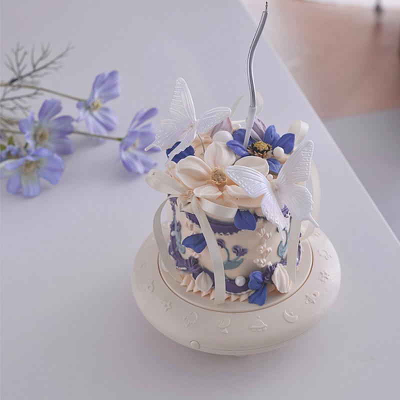 Picture of Rotary dessert birthday driver automatic rotating dessert machine rotary dessert machine cake display stand birthday party decoration