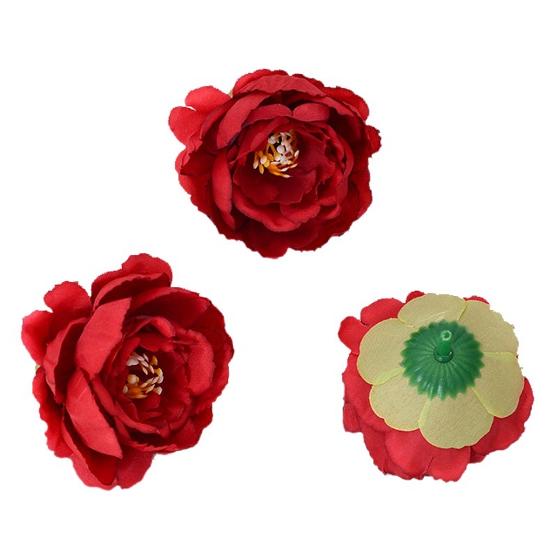 Silk flowers are bright and complete in color. The living room is placed for wedding ceremony. The background flowers are arranged with exquisite peony heads.