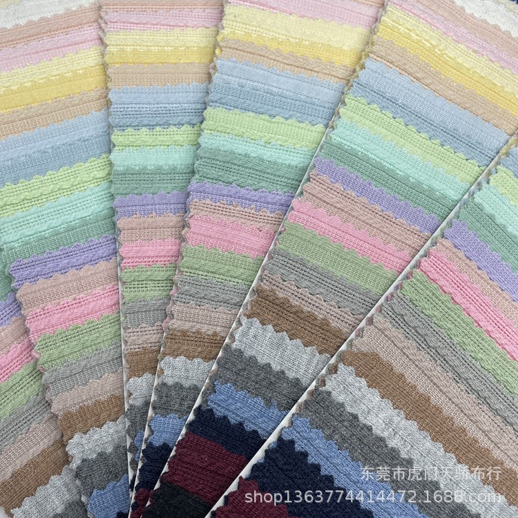 Spot supply of new knitted TR irregular rib pit jacquard 260g polyester cotton pit cloth casual material