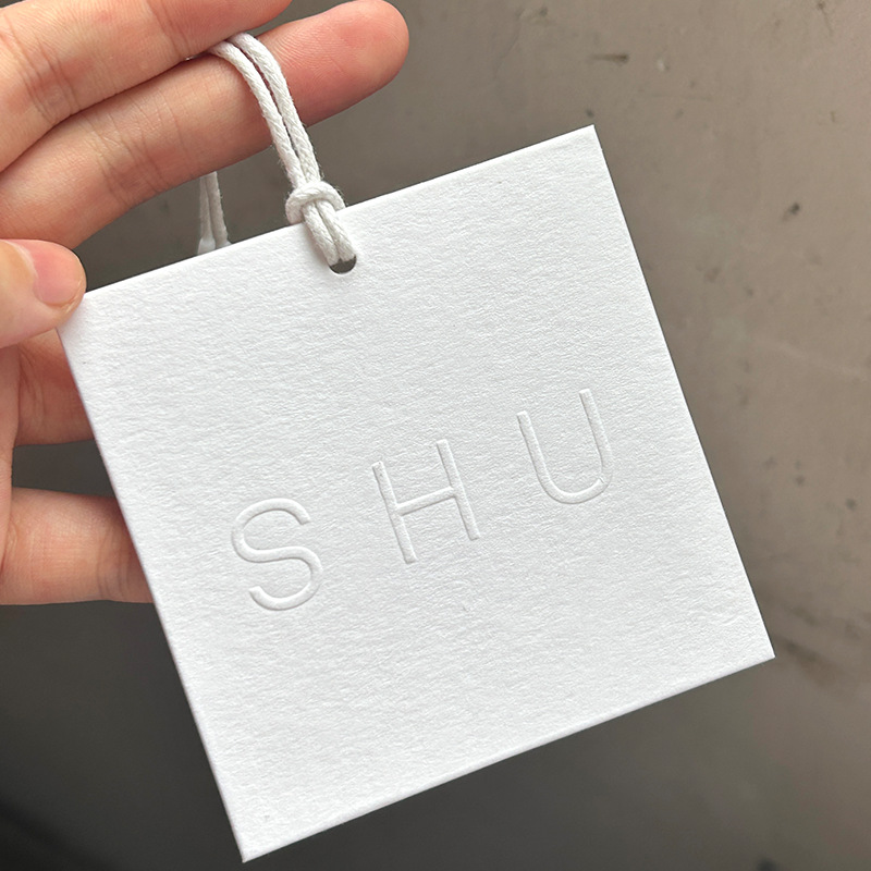 Picture of Tag Label Production and Design Factory High-End Universal Clothing Tag Certificate Printing Logo Women's Clothing Hanging Tag