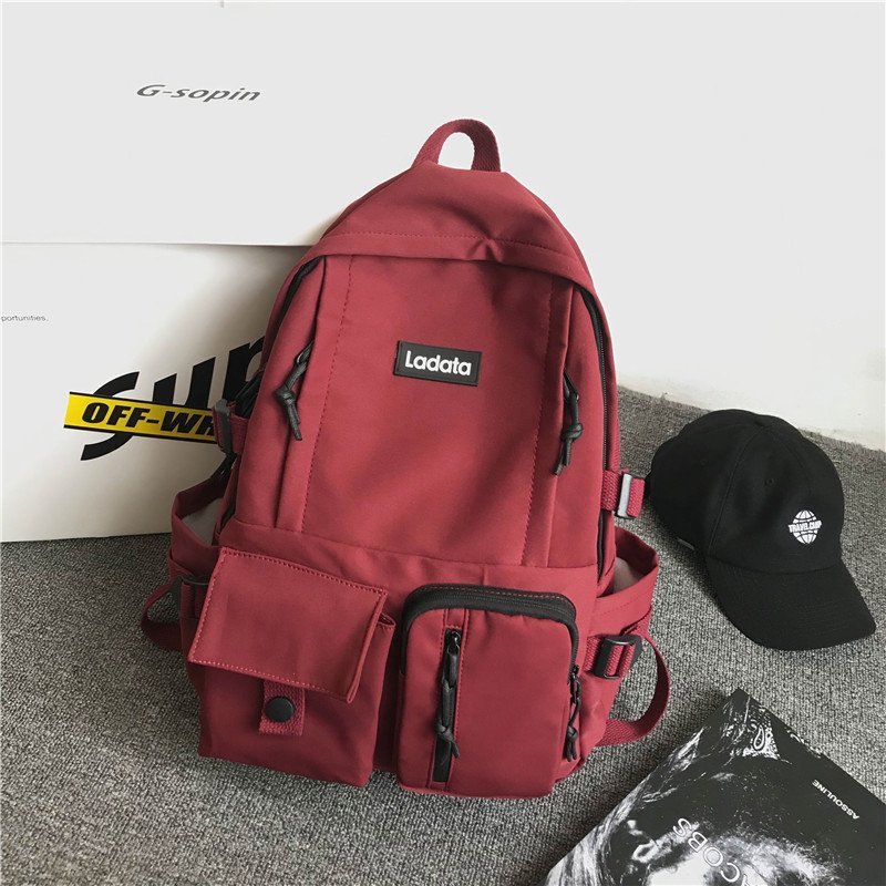 Picture of 2024 new Korean version of simple student schoolbag anti-theft anti-seismic college style backpack computer backpack wholesale LOGO
