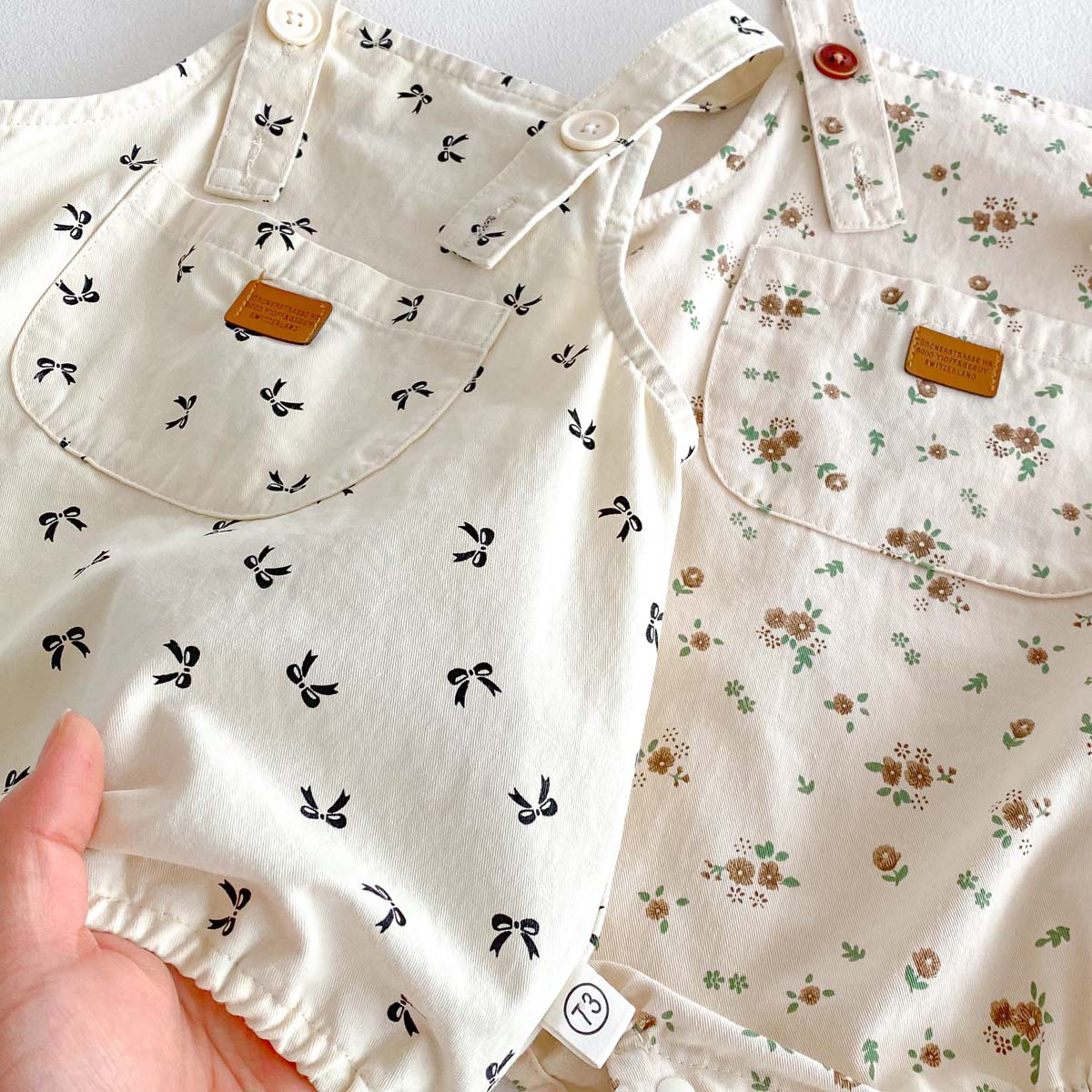 Picture of 2025 spring new baby printed strap jumpsuit for boys and girls baby cute sling full moon climbing suit