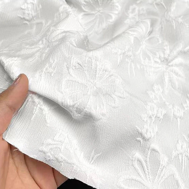 Floating sunflower four-sided elastic fabric milk white Chinese clothing three-dimensional fabric pleated texture flower jacquard cheongsam manufacturers
