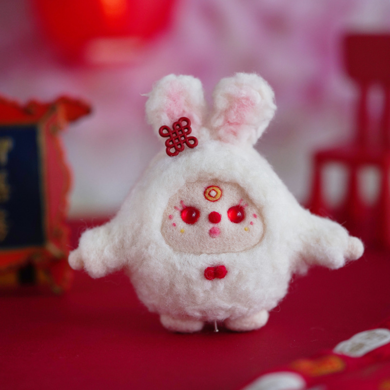 Picture of Velvet rabbit New Year Cartoon Doll wool felt pokes diy material package handmade gift pendant New Year