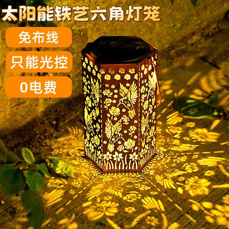Cross border solar wrought iron lanterns, solar courtyard garden lights, hollow hummingbird hanging lights, balcony lawn projection lights