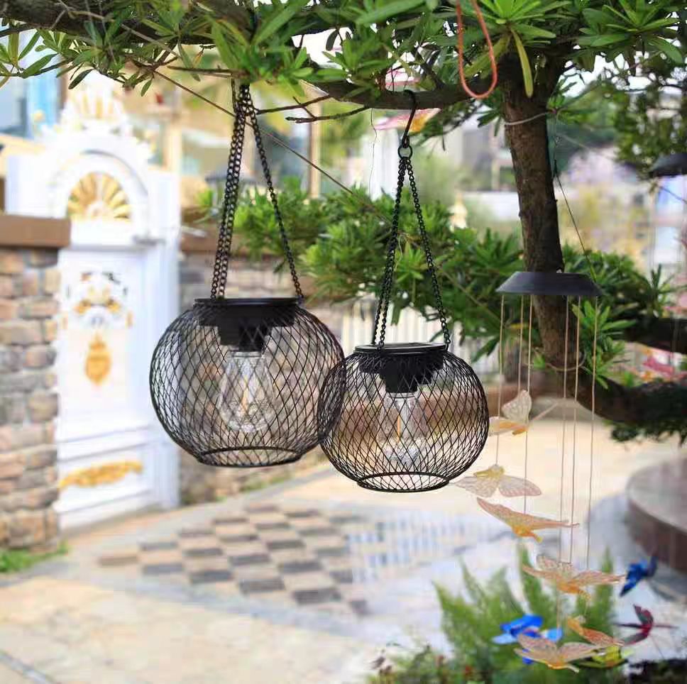 Picture of Amazon Solar Iron Lantern Lamp Retro Net Chandelier Outdoor Garden Courtyard Decoration Hollow Lantern Super Bright