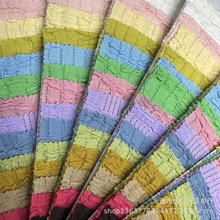 Spot new knitted wrinkled fabric 150 grams of Yunxiao wrinkled knitted polyester wrinkled fabric fashion clothing materials