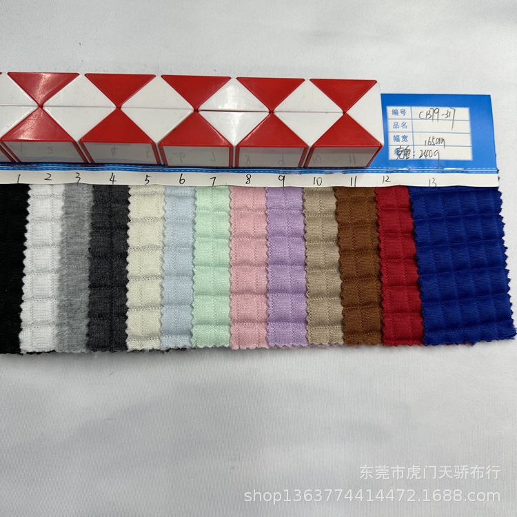 In stock supply knitted bottom by quilted jacquard 240g small plaid quilted cotton jacquard casual clothing material