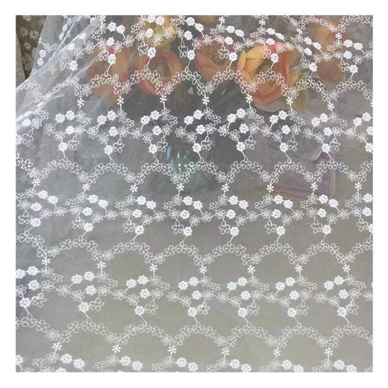 New lace milk silk small flower embroidery fabric spring and summer girls dress mesh embroidery fabric manufacturers