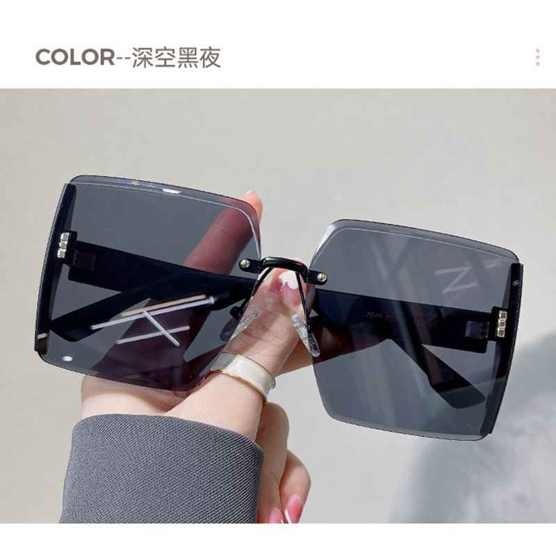 Picture of Em Home 2025 New Frameless Sunglasses Women's Glitter Mirror Edge Anti-Uv Big Face Slimming Live Broadcast Sunglasses