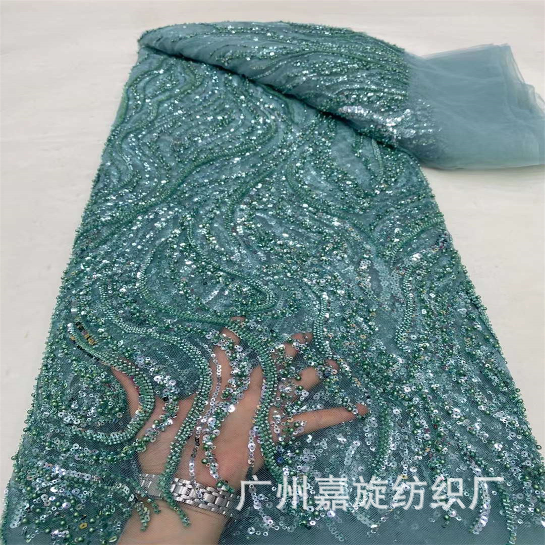 Picture of Spring and Summer 2024 New Polyester Mesh Size Fingerprint Sequin Bead Tube Embroidered Cloth African Fashion dress Dress Fabric