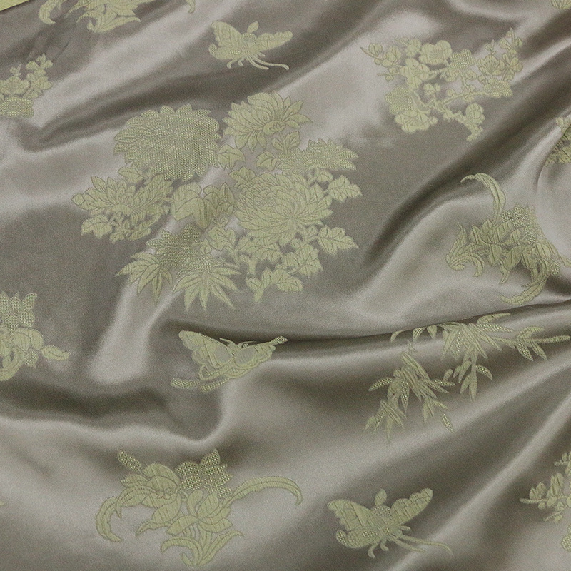 Picture of Four Gentlemen Silk | Plum, Orchid, Bamboo, and Chrysanthemum Crown Pleated Jacquard Silk Fabric with Embossed Pleats New Chinese Style National Fabric