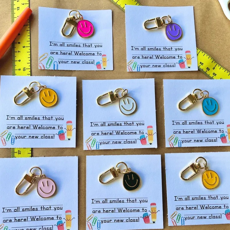 Picture of Cross-border e-commerce alloy color dripping smiley face keychain electroplated gold irregular expression bag pendant accessories