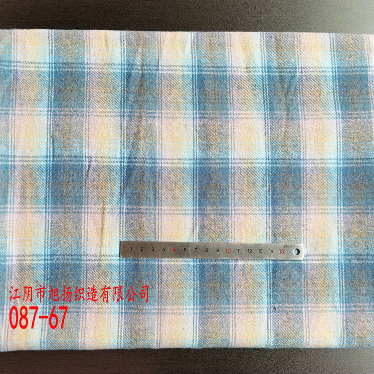 Picture of in stock brushed plaid fabric spring and summer women's shirt cloth 21 polyester cotton woven flannel plaid lining