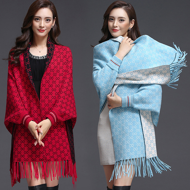 Autumn and winter warm jacquard geometric cape women's long sleeve knitted outer tower cheongsam cape spring cross-border tassel double-sided shawl