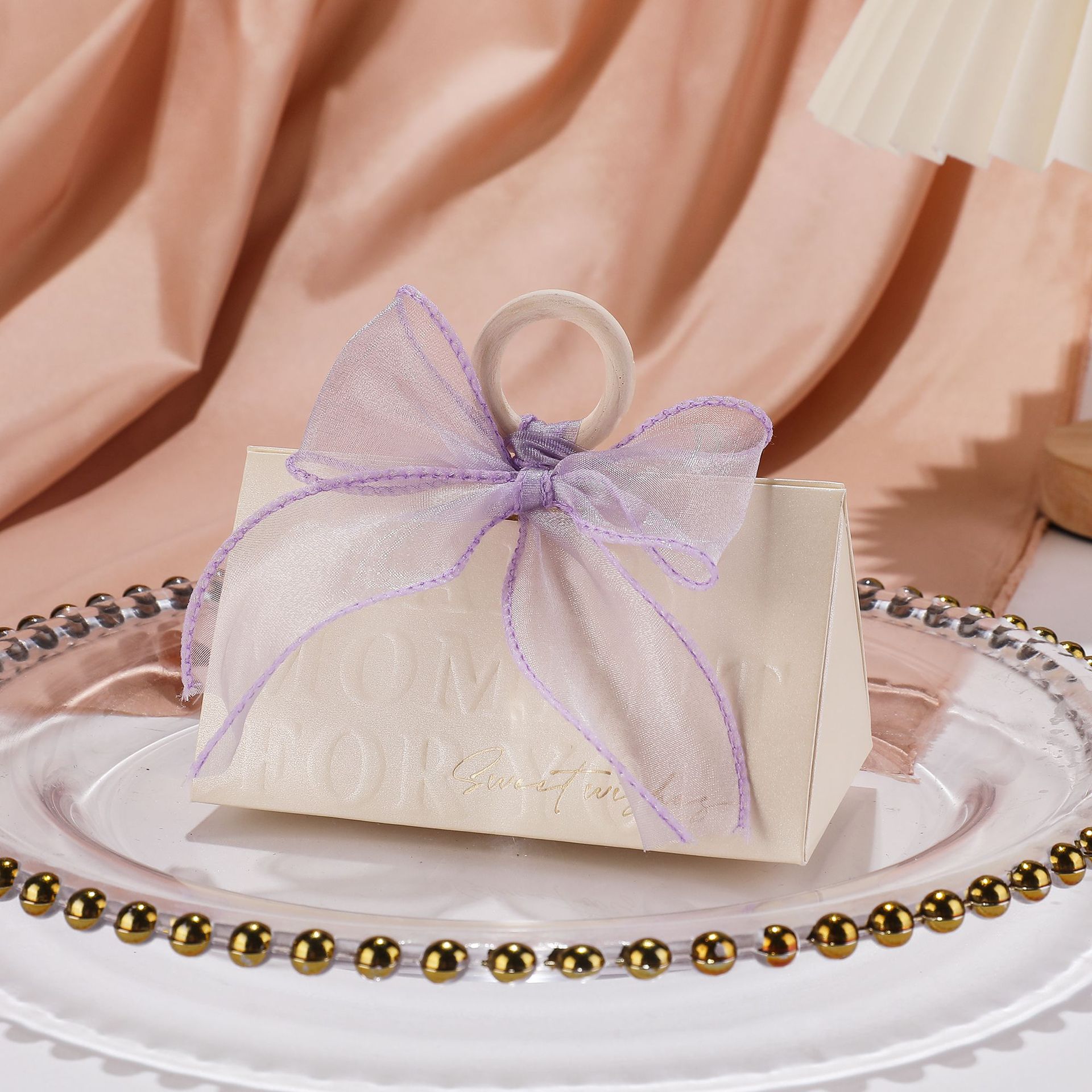 Picture of Light luxury champagne hand-held triangle wedding candy box wooden ring hand gift box wedding candy box wholesale