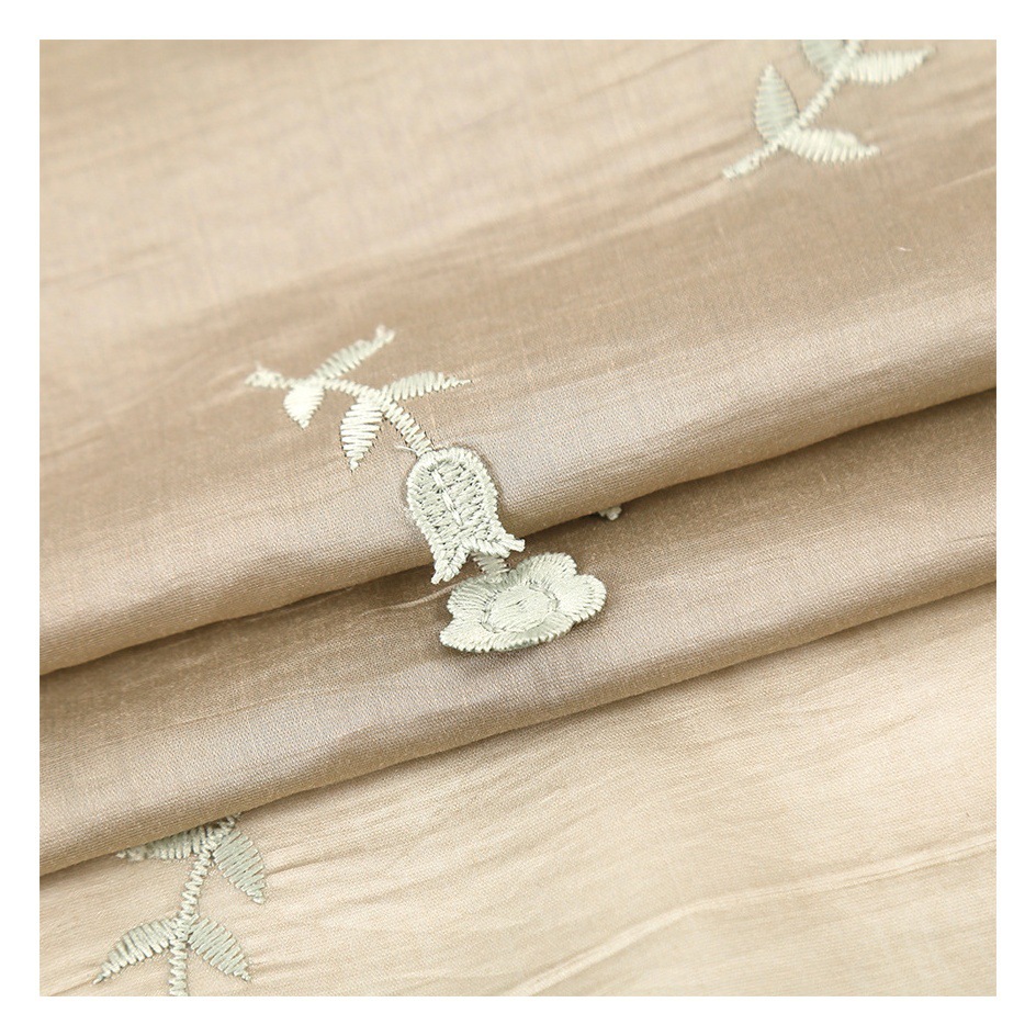 2023 new Tencel nylon wind chimes flower Three-Dimensional Embroidery fabric women's clothing embroidery fabric in stock supply