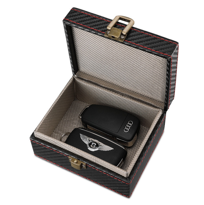 Picture of in stock small size carbon fiber foreign trade explosion car key signal shielding box RFID mobile phone signal radiation protection box