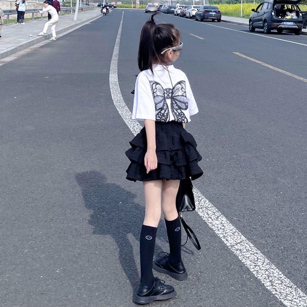 Picture of Girls Summer Suit 2025 New Cake Skirt Fashionable Kidsren's Short-Sleeved T-Shirt Fashionable Pleated Skirt Two-Piece Set
