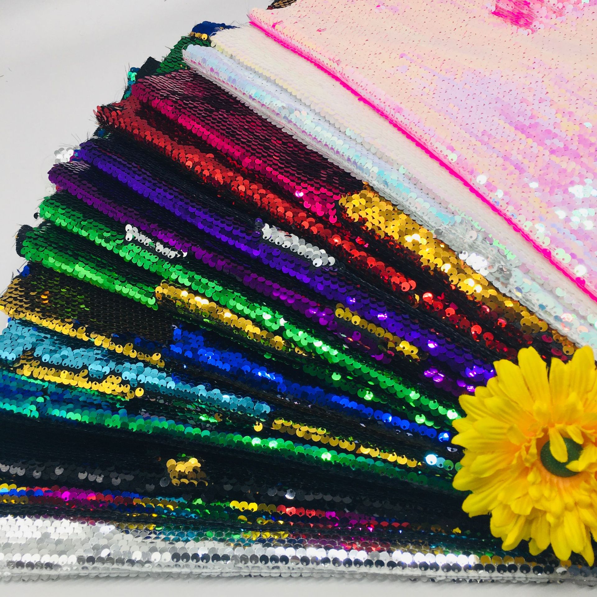 Picture of in stock 50 color sequin fabric 5mm double-sided flip Internet red background wall clothing luggage decorative sequin cloth cutting