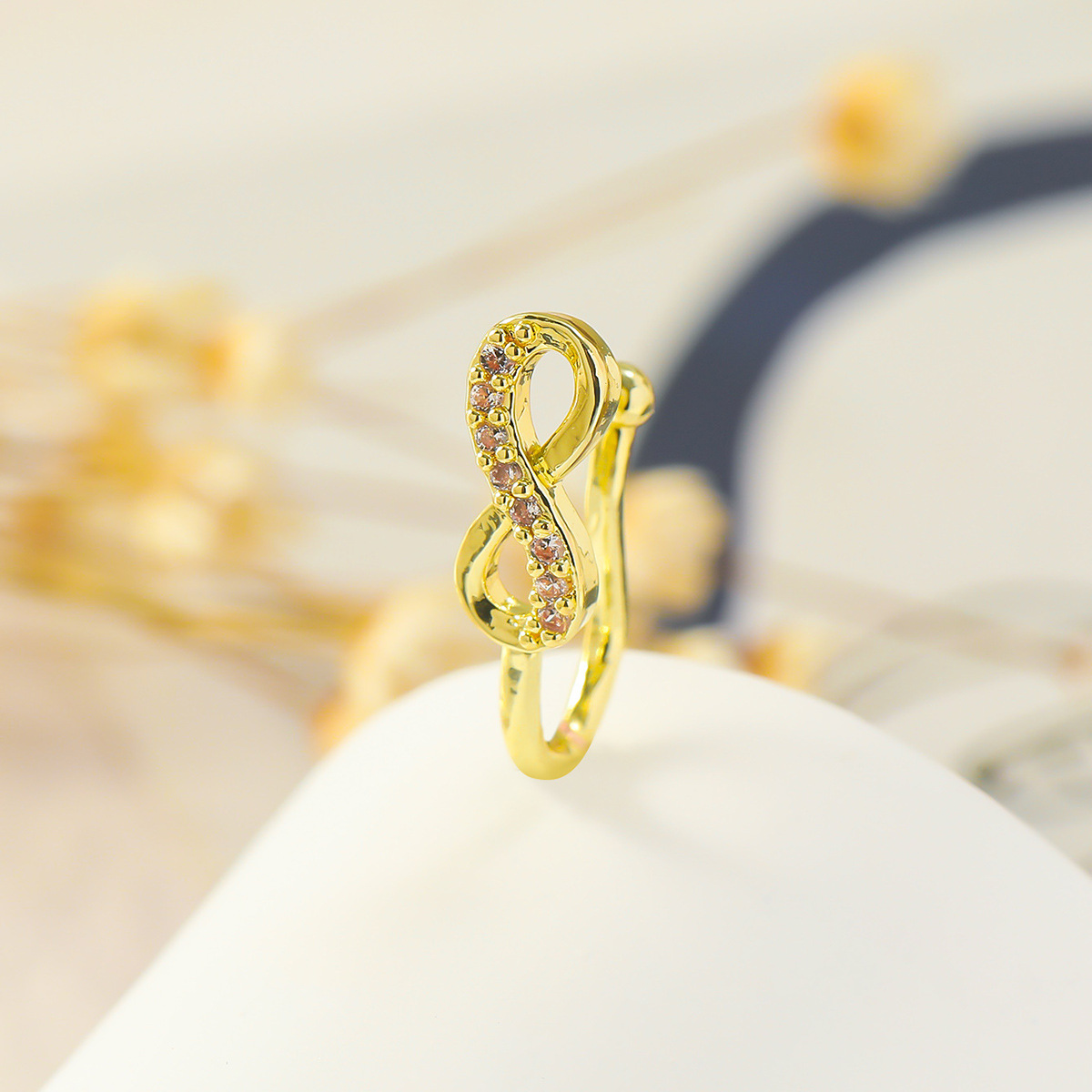 Picture of A Nose Clip with a Sparkling Elegant, an 8-Shaped Nose Clip, Micro-Paved Zircon Adjustable Nose Nail, Nose Ring Piercing Jewelry