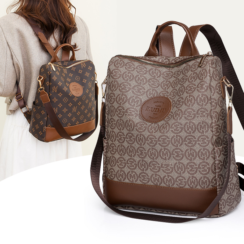 Picture of Backpack Women's Korean Style New Printed Retro Fashion Soft Leather Bag Large Capacity Work Travel Backpack Trendy
