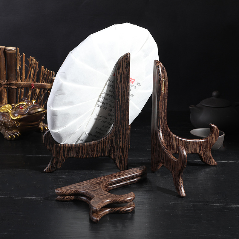 Picture of Pu'er tea shelf imitation solid wood tea cake stand seven-seed cake display stand White Tea porcelain plate disc crafts stand display stand
