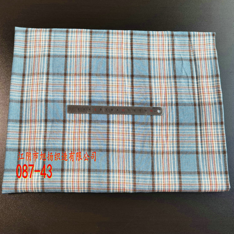 Picture of in stock brushed plaid fabric spring and summer women's shirt cloth 21 polyester cotton woven flannel plaid lining