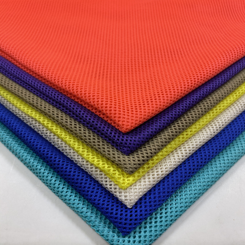 Spot supply of polyester 75D low elastic small four corner mesh fabric school uniform sportswear lining shoes and hats luggage mesh fabric