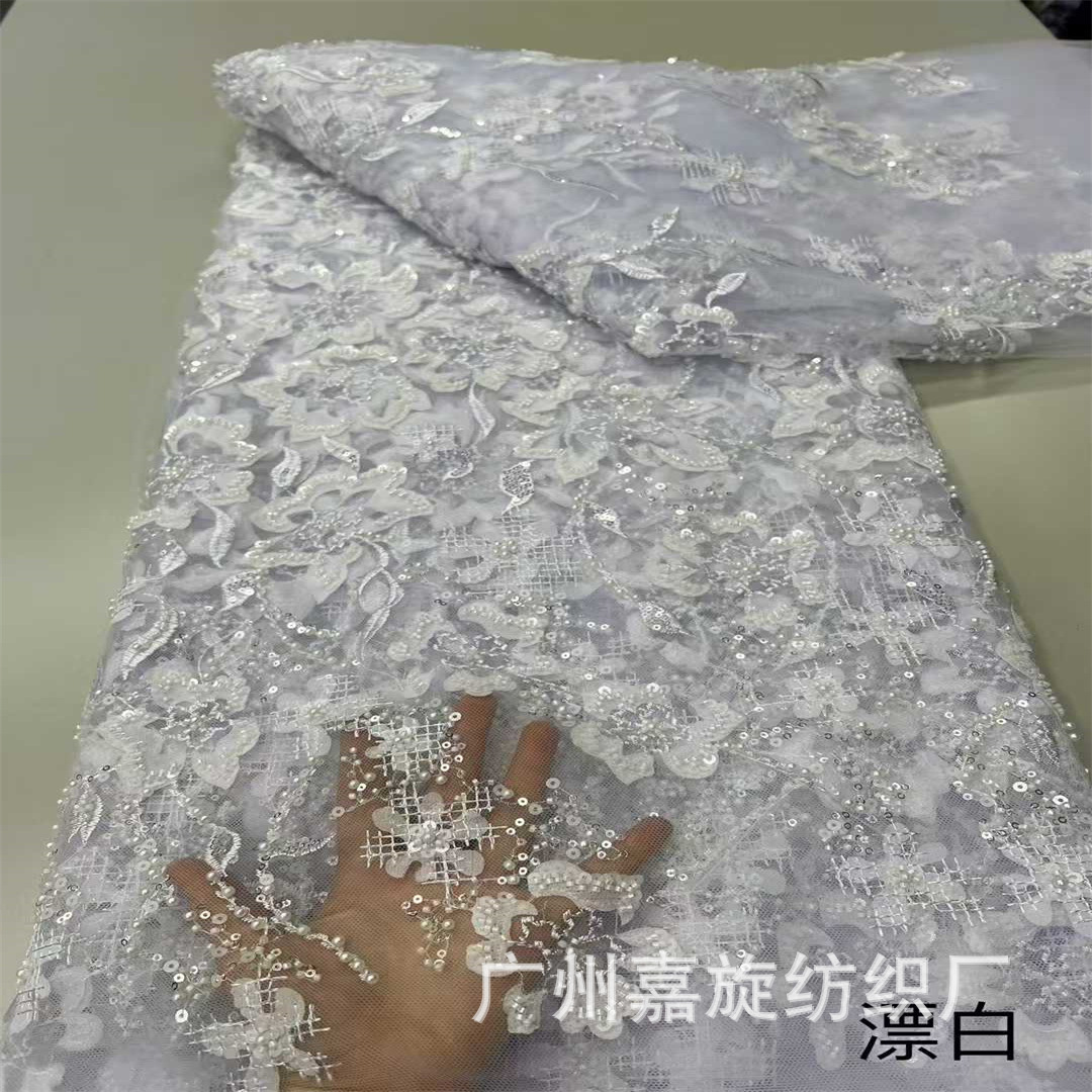 Picture of 2025 New Laser Floral Mesh Yarn Bead Tube Embroidery 3D Applique Pearl Sequin Embroidery Fashion Lace Fabric Beaded