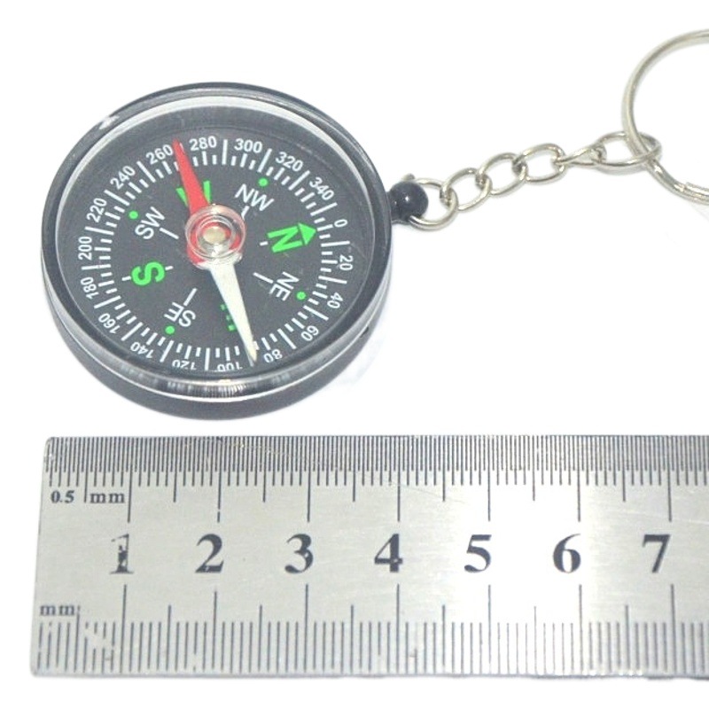Black compass keychain mobile phone pendant car compass north needle one yuan two yuan department store wholesale