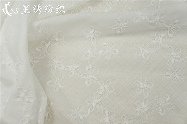 Picture of Hot-Selling Plaid Chiffon Embroidered Fabric with Small Pom-Poms, Five-Petal Flower Embroidery, Skin-Friendly Chiffon Long Dress, Sun Protection Clothing Fabric