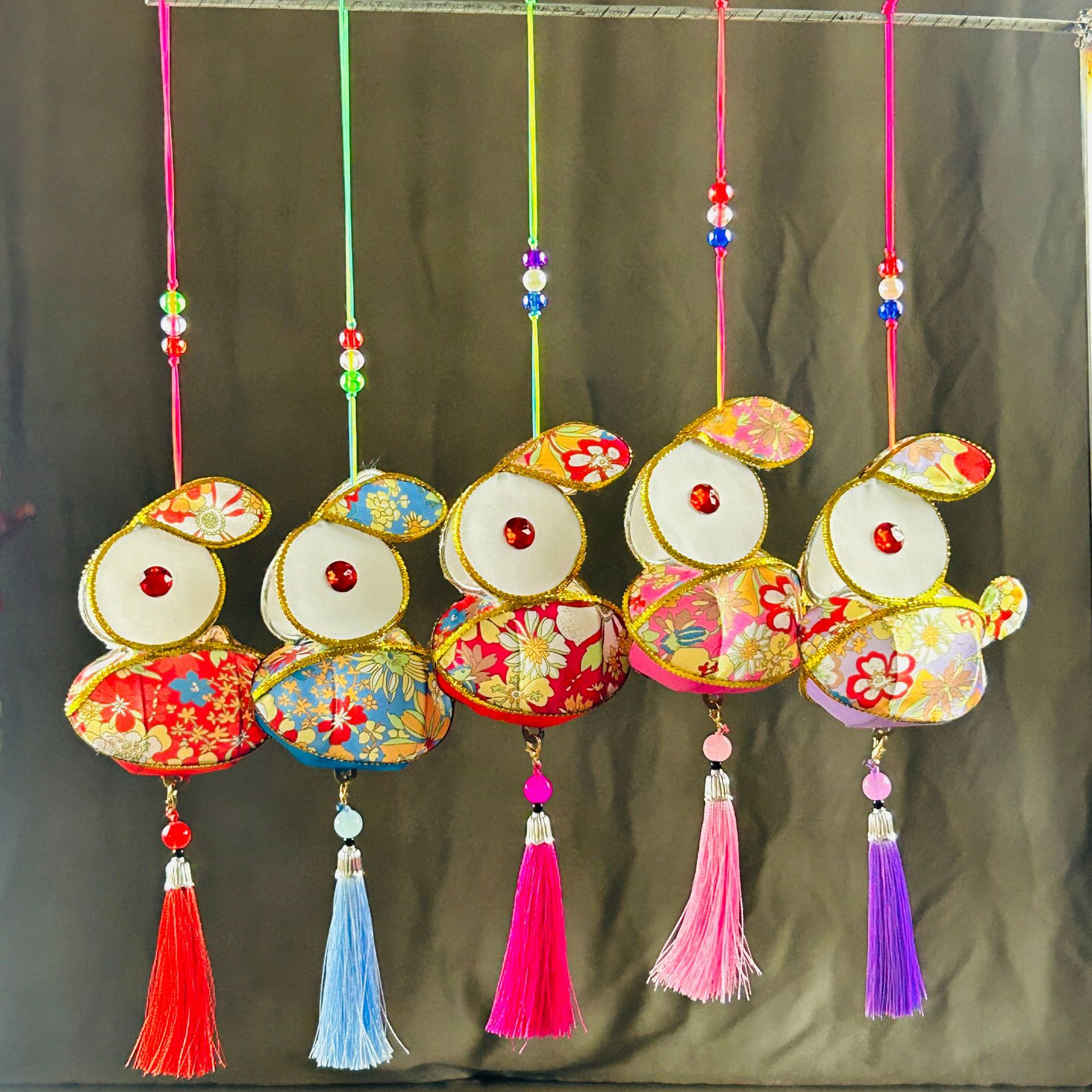 Picture of Traditional Handmade Lanterns for Spring Festival Lantern Festival Portable Iron Silk Cloth Luminous Mini Rabbit Lantern