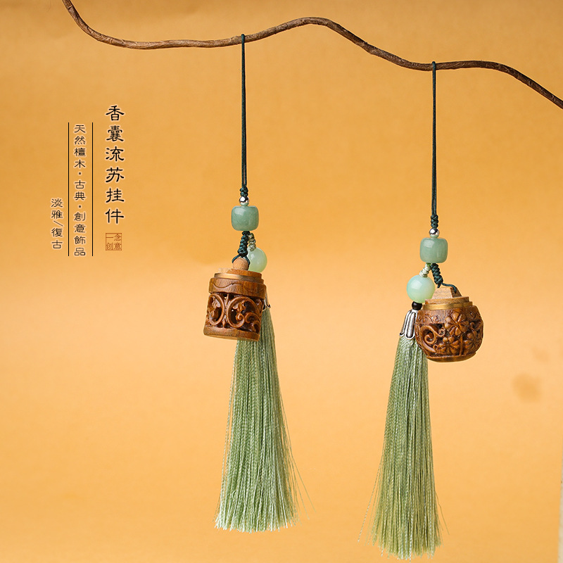 Factory sales hollow carved green sandalwood fragrant wood bottle pendant flow comb bag pendant sachet box mobile phone pendant