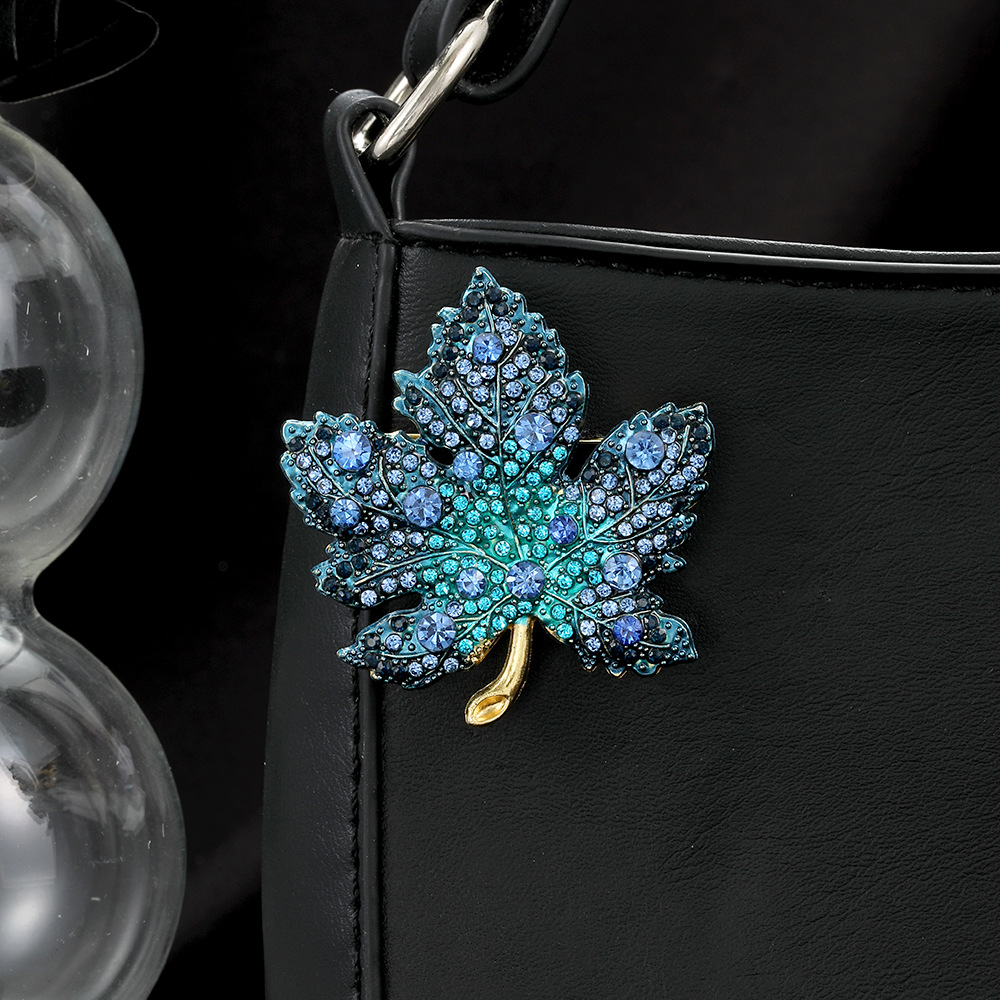 Picture of Cross-border European and American diamond-encrusted gradient red maple leaf brooch vintage design exquisite fashion coat suit pin