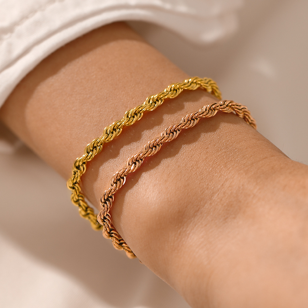 European and American fashion gold-plated twist chain stainless steel bracelet women's INS trend personality Joker titanium steel bracelet wholesale