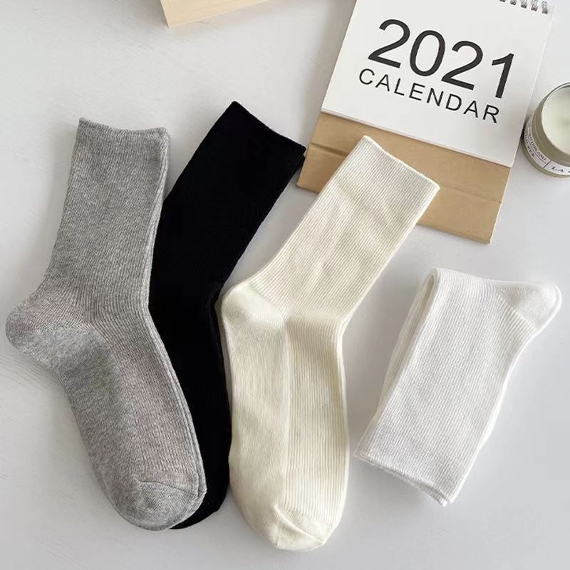 Spring and summer milk white JK socks women's mid-calf socks pile socks solid color breathable Japanese style all-match black new women's socks