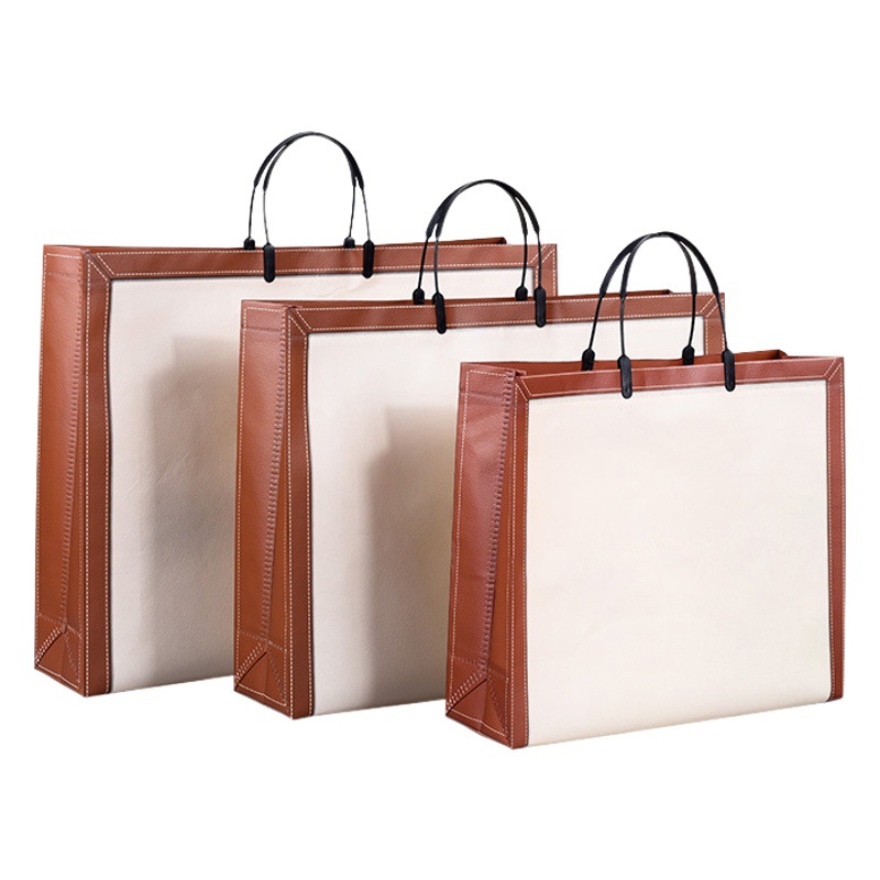 Shopping portable clothing store clothes bag packaging waterproof non-woven ear bag printing logo non-woven bag