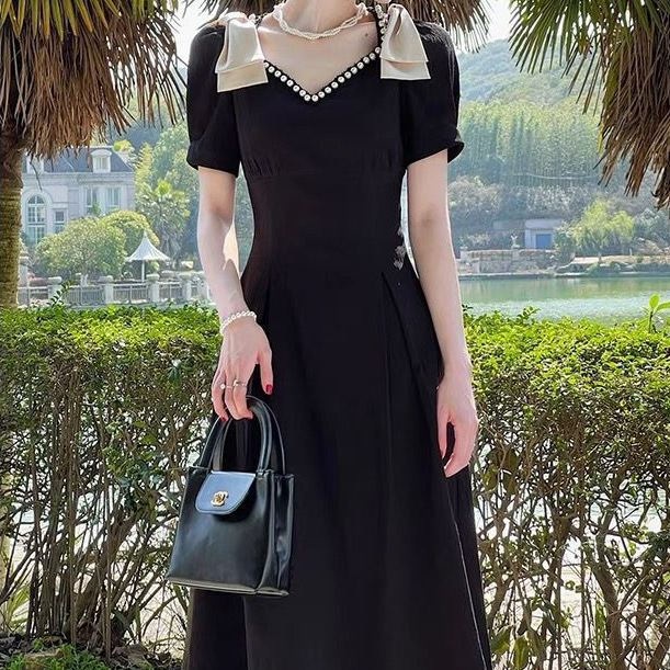 2024 Summer New Women's Dress Mid-length Slim-fit Round Neck Short-sleeved Black Bow Women's Dress