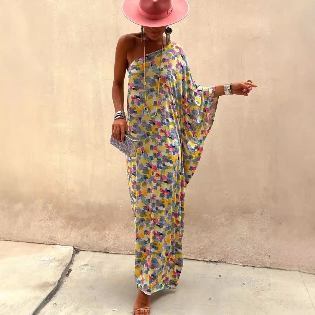 Long dress: internet-famous printed loose dress, independent dress, same style INS asymmetrical shoulder new cross-border station